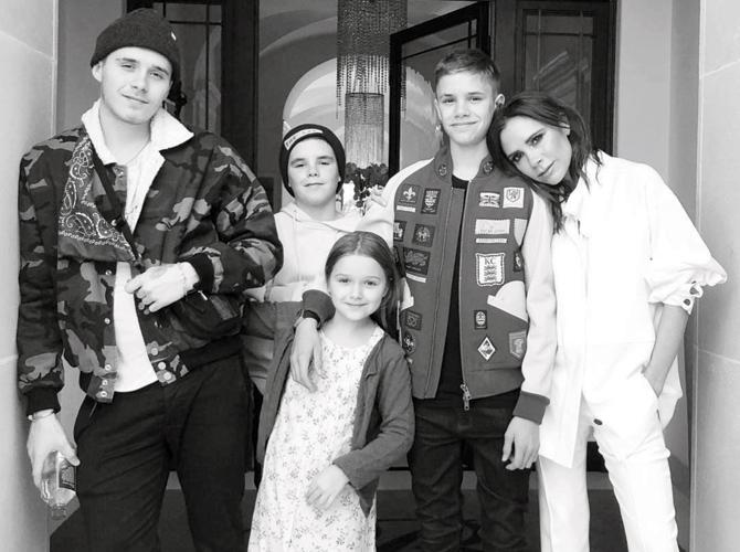 Victoria Beckham (extreme right) with her three sons and daughter