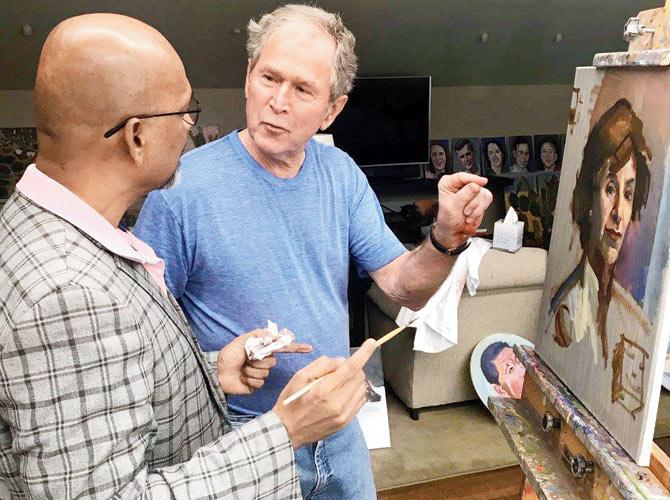 Tonape explains to Bush the finer aspects of portraiture