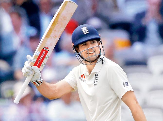 Alastair Cook celebrates his fifty v Pak yesterday. Pic/Getty Images