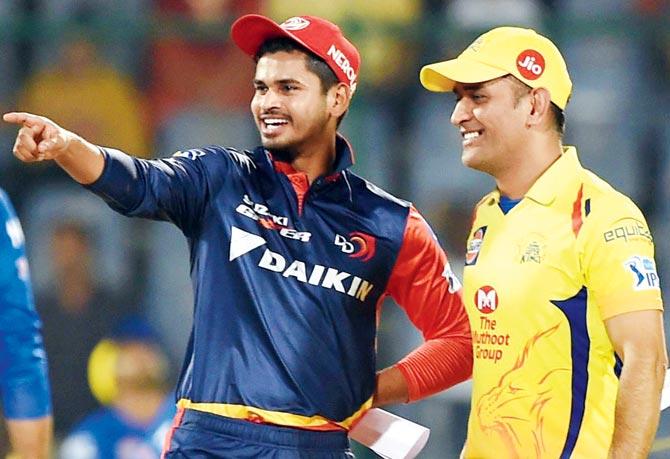 Delhi skipper Shreyas Iyer and Chennai captain MS Dhoni share a light moment ahead of the toss during an T20 tie at the Feroz Shah Kotla this year. Both players will be part of the Indian squad for the tour to England in July. Pic/AFP