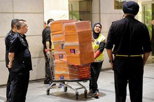 Cash-filled handbags seized in raids on ex-Malaysia PM's home