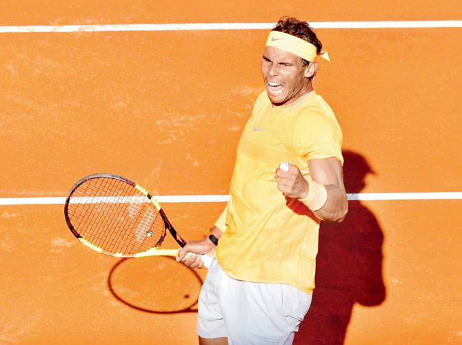 Rafael Nadal celebrates after winning the semi-final against Novak Djokovic in Rome on Saturday. Pics/AFP