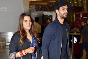 Neha Dhupia, Angad Bedi spotted at New Delhi airport enroute to the US