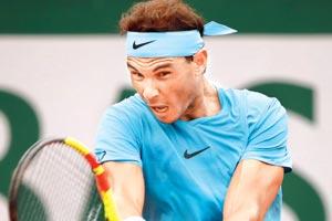 French Open: Rafael Nadal overcomes Simone Bolelli in 2-day rain-marred tie