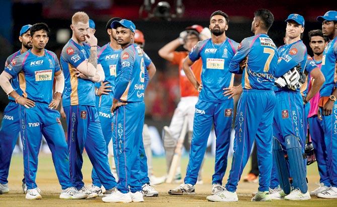 Rajasthan Royals players await a review during their IPL encounter against Kings XI Punjab at Indore on Sunday. Pic/AFP