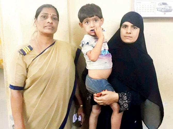 Sabina with her mother at the Wadala police station