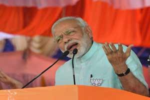 Narendra Modi: Boy with golden spoon won't understand poverty
