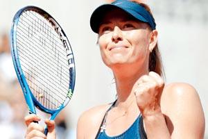 French Open: Maria Sharapova digs deep to win on return
