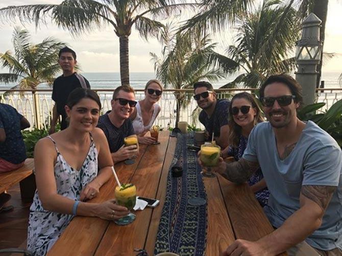 Mitchell Johnson posted this picture of a lunch outing with his wife and friends. Johnson wrote, '@jessicabratichjohnson @brianbratich @michmorry @jodielee1985 @daz______ What a crew !! #fizzpit #kidfree #bali'