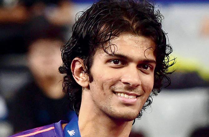 Mumbai shuttler Ajay Jayaram decorates a colourful rangoli