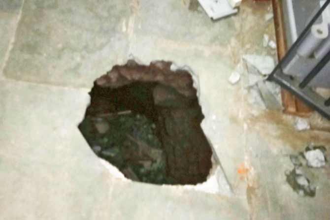 The hole that was dug through the floor of the bank