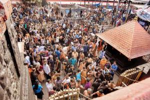 Sabarimala row: Devotees try to stop woman, attack scribe