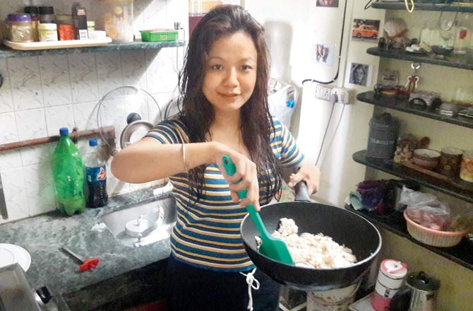 Esha Sahor Lepcha in her kitchen