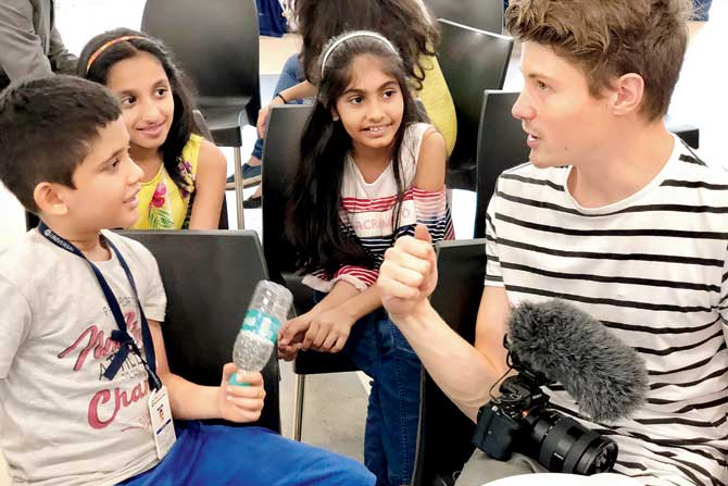 Popular German vlogger Felix von der Laden interacts with students at the Universal School in Ghatkopar