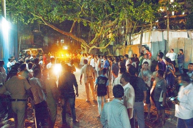 Residents gathered on the ground floor following the fire. Pics/Satej Shinde