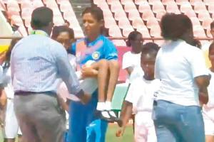 Harmanpreet's gesture of carrying ill girl off the field wins hearts