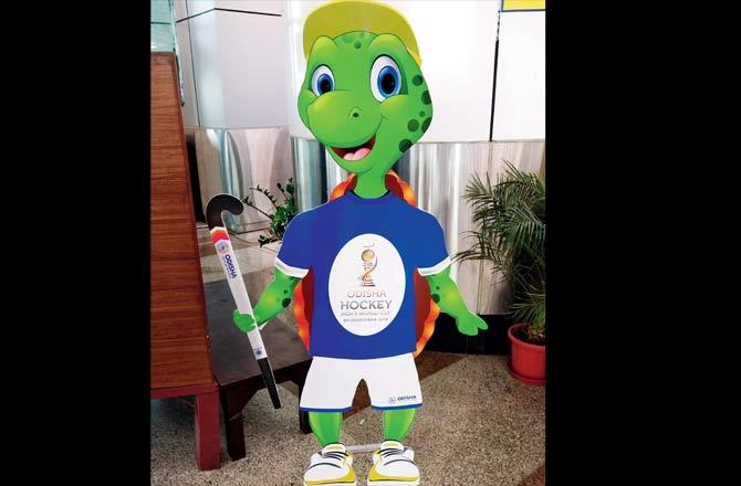 A poster of the Hockey World Cup mascot Olly the Olive Ridley turtle at Bhubaneswar airport