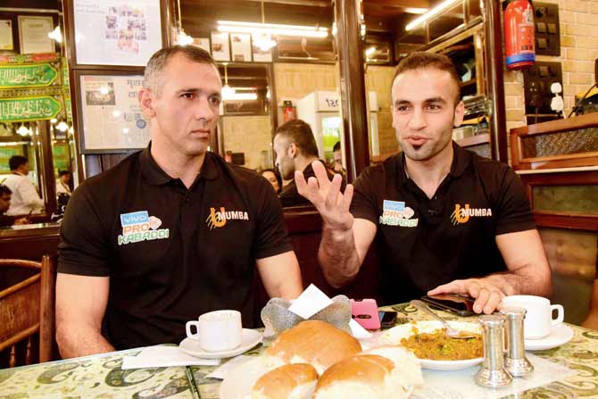 U Mumba captain Fazel Atrachali (right) and coach Gholamreza Mazandarani at Cafe Irani Chaii. Pic/suresh karkera