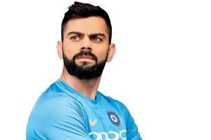 Virat Kohli enjoys the rains by having pakodas