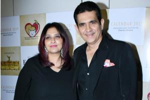 Omung Kumar auctions hand painted animal calendar for charity