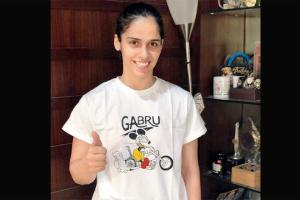 Bride-to-be Saina Nehwal poses in her Mickey Mouse tee