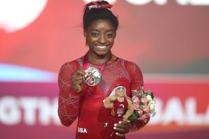 World Championships: Biles wins world floor gold to enter record books