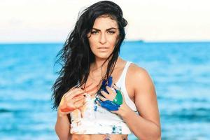 WWE star Sonya Deville recalls coming out as lesbian live on TV