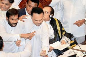 Sri Lankan lawmakers come to blows, leave one bleeding