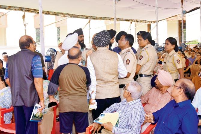 Bouncers and police personnel at the AGM at NRI Complex