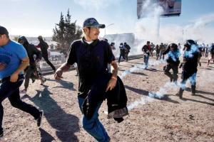 Tear gas chokes kids at Mexico-US border