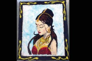 Mumbai shuttler Ajay Jayaram decorates a colourful rangoli