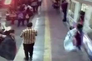 Video: Woman saved by commuters after she falls from moving train