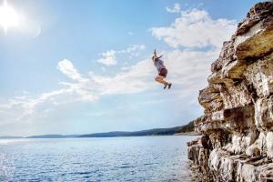 Dive from the cliff of risk into joy