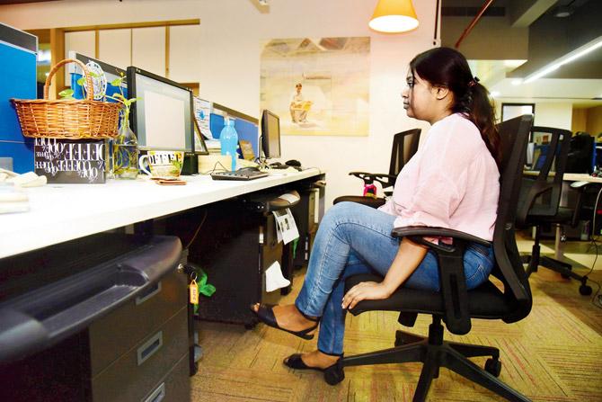 Seated marches: Start by sitting upright on your office chair or bench with your hair tied up and look straight . A chair without an arm rest works best for this exercise so your movement isn’t restricted. Place your hands beside your thighs and lift one leg up at a time in a marching movement. Repeat the exercise 10 times with each leg and do two sets. 