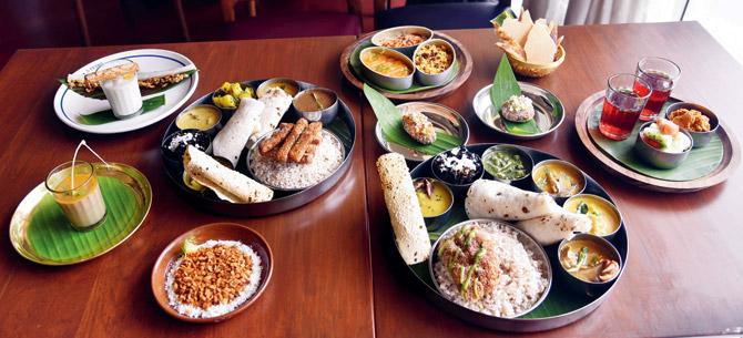 (Clockwise from top on table one) Tender coconut pudding, vegetarian jay-vun, bhaj ke pohe, moong sar;  (On table two) half plates, corn dangar, kokum kadhi, seafood jay-vun, bangda cutlet. Pics/pradeep dhivar