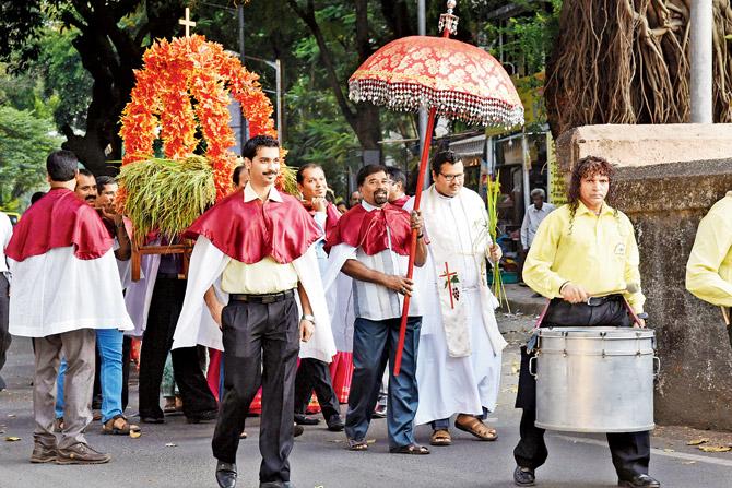 An East Indian procession, complete with a band, proceeds to the IC Church in Borivali during Agera celebrations on October 7. Pic/Nimesh Dave