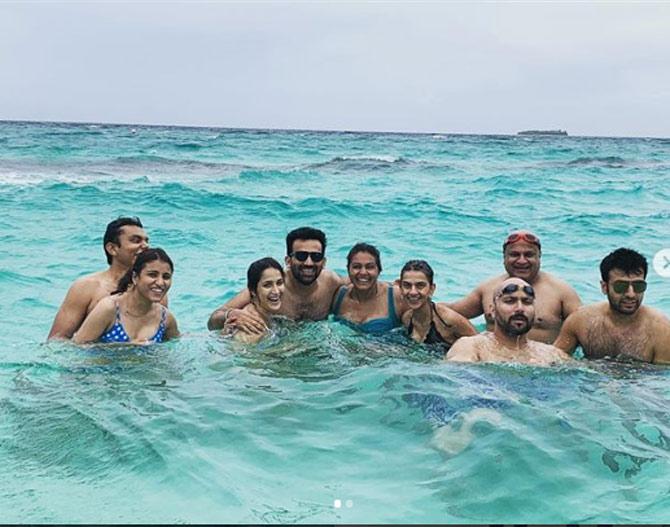 Sagarika Ghatge, Zaheer Khan and the gang, riding the waves in the middle of the ocean. She captioned, 'Beach bummin!! @jamanafaru_maldives'