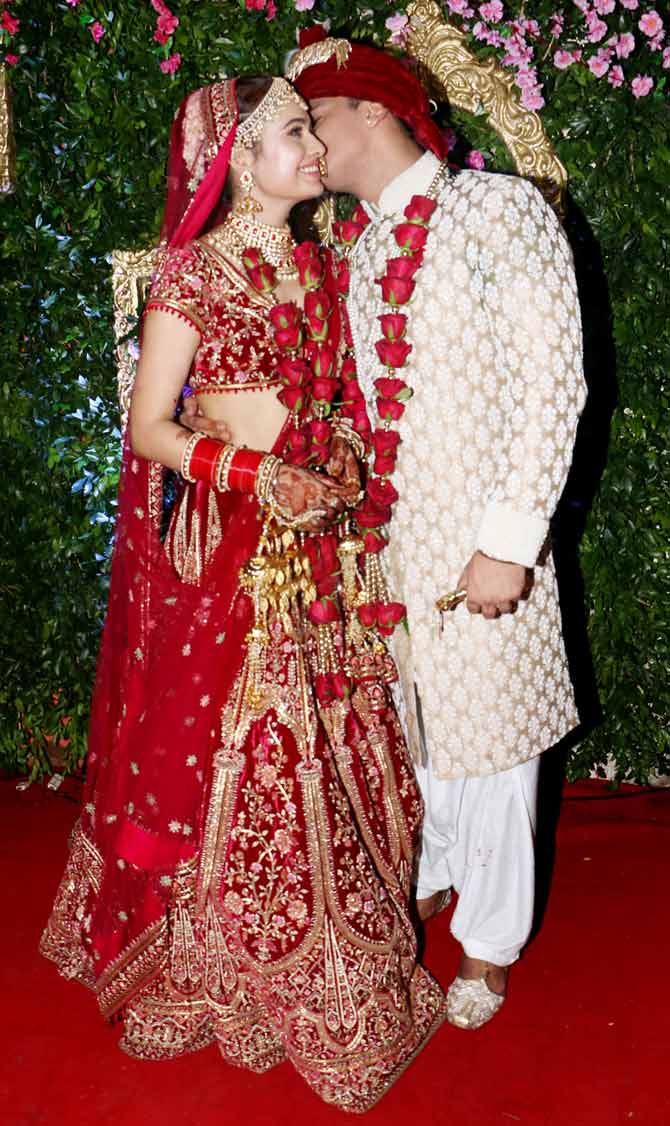 How adorable is this picture, where the groom Prince Narula is planting a peck on bride Yuvika Chaudhary's cheek!? Describing his love for Yuvika, Prince had once in an interview said that he is lucky to have got so much love, and considers her to be a good life partner for him. Whereas Yuvika had said, 'One thing I liked a lot about Prince is that he does what he says, and that's why I love him.'