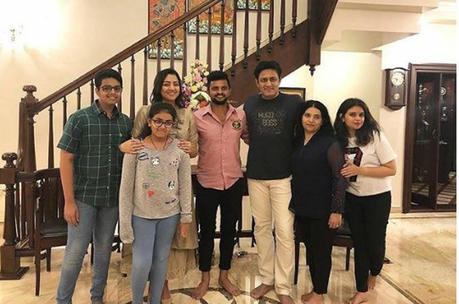Anil Kumble is nicknamed 'Jumbo' not only because of his deliveries, for a spinner, are 'as fast as a jumbo jet', but also because Anil Kumble's feet are quite big or 'Jumbo' as observed by his teammates. In picture: Anil Kumble's family with Suresh Raina's family when the latter came over for dinner. 