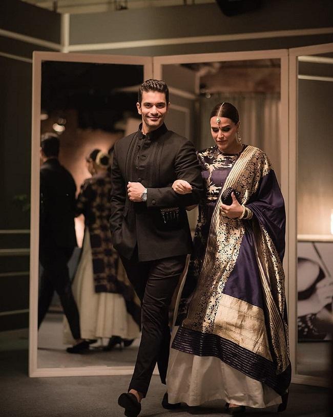 Neha Dhupia reminisced about how it all started, 'Angad proposed to me in the nicest way possible wherein he went straight to my parents and then my mom called me saying that he is the nicest guy for you. But back then, I thought it wasn't the right time and said no to his proposal.'