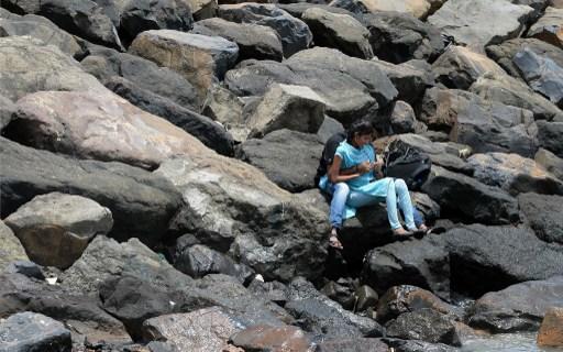 In all the hustle and bustle and fast pace that the city of Mumbai throws at them, lovers do find it hard to spend some quality time. However, they make the most of the few minutes or hours that they get to spend with each other like (in this picture) whispering sweet nothings to each other.    