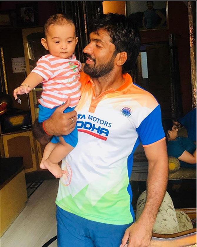 Yogeshwar Dutt is truling a doting dad! He shared this picture of himself spending quality time with his son.