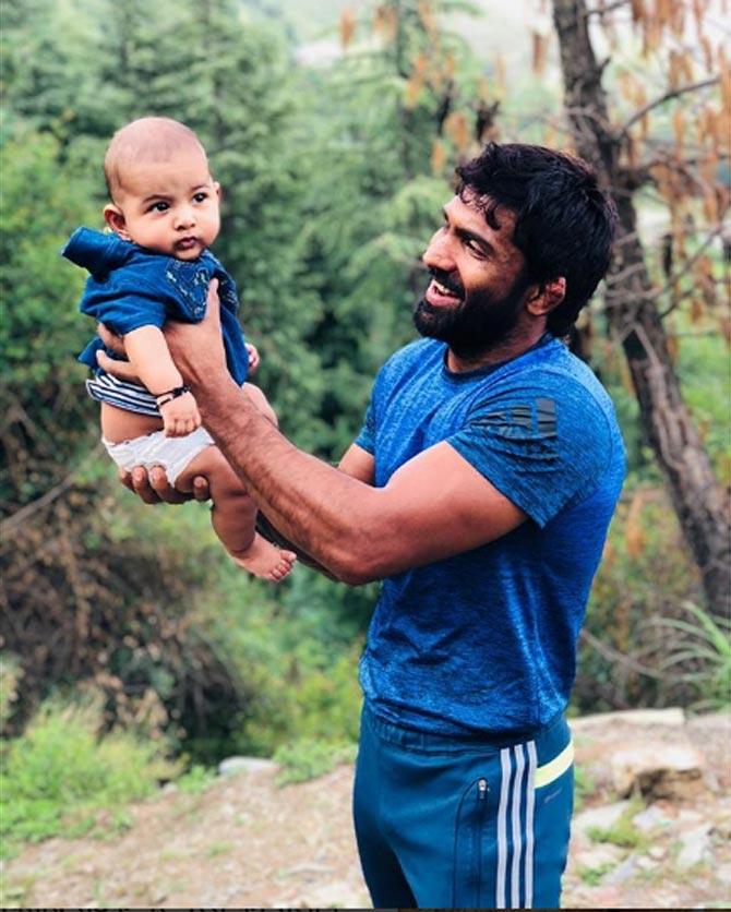  In picture: Yogeshwar Dutt seen spending some father-son time with his child