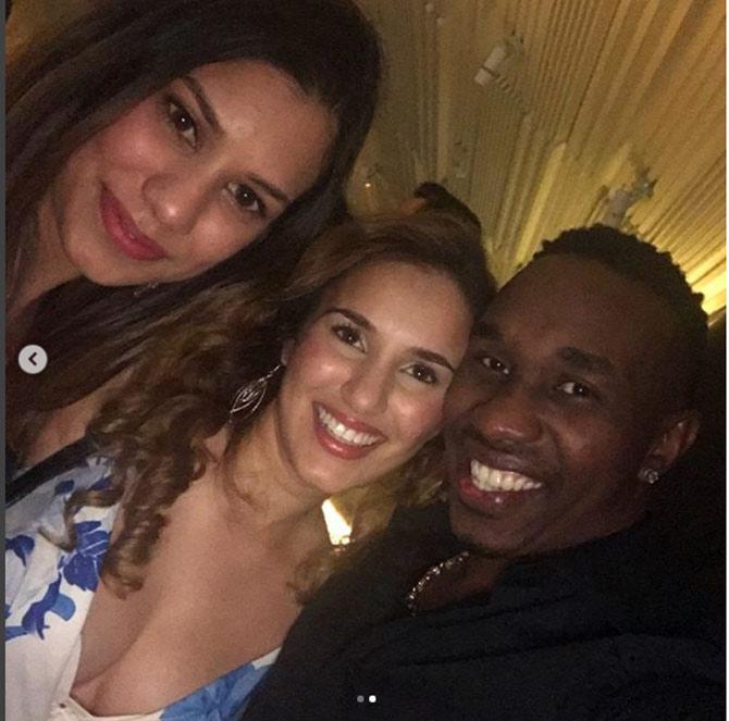 Dwayne Bravo having a gala time with a couple of his friends in Australia. He wrote, 'Chilling with two of my beautiful friends @alannahdcruz An @chantelledcruz #melbourne #australia nice like a pie #Champion #DJBravo #400'
