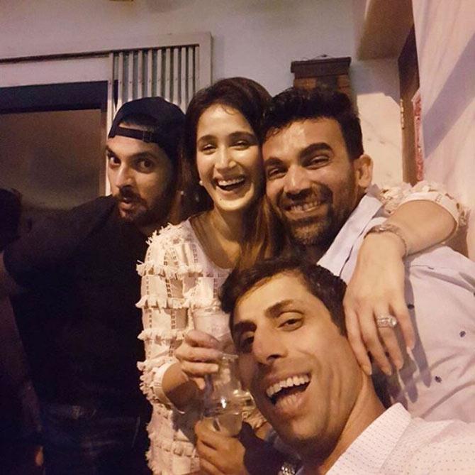Sagarika Ghatge posted this picture of herself with Ashish Nehra, Yuvraj Singh and Zaheer Khan during a Christmas dinner.