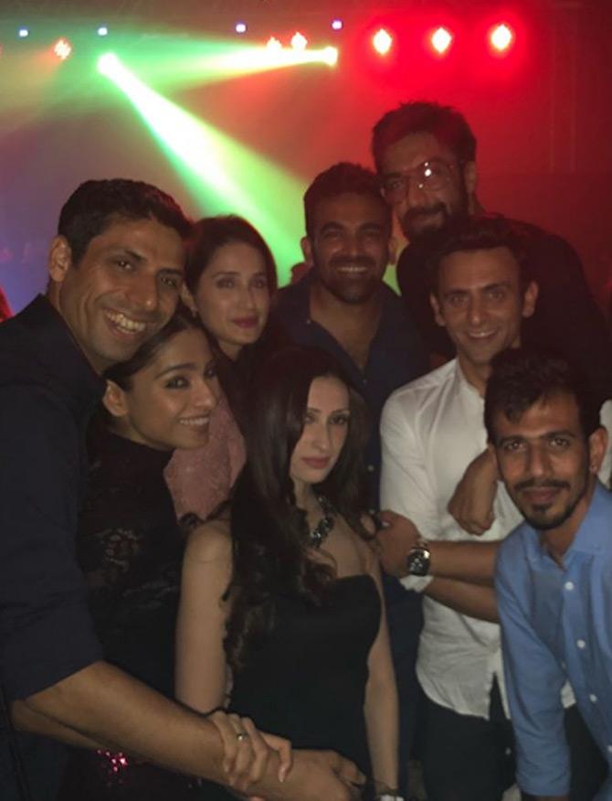 In picture: Sagarika Ghatge with husband Zaheer Khan and other friends from a Christmas party.