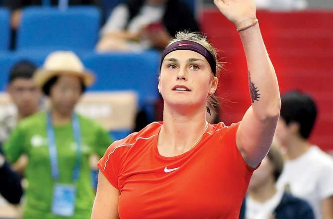 Belarusian Aryna Sabalenka celebrates her first round win over Australia