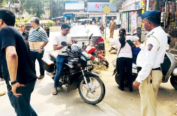 After locals insisted, the police caught and fined several bikers for riding on the wrong side of the road. Pics/Courtesy Safer Roads @Orlem