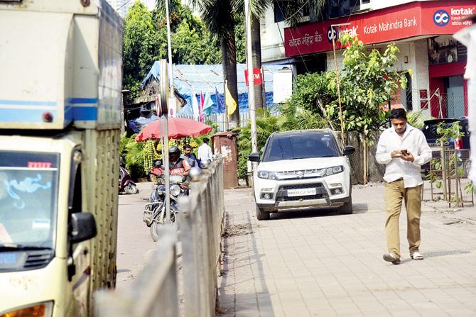 This motorist seems oblivious to pedestrians