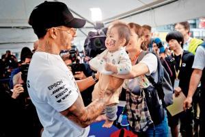 Baby's day out for Lewis Hamilton ahead of the Japanese Grand Prix